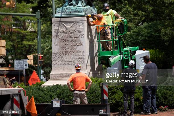 The statue of Meriwether Lewis, William Clark and Sacagawea is removed from Charlottesville, Virginia on July 10, 2021. The southern US city of...