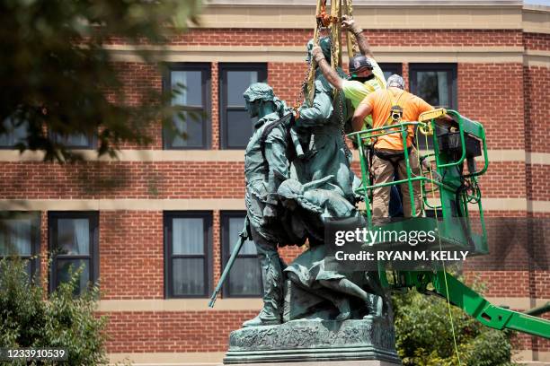 The statue of Meriwether Lewis, William Clark and Sacagawea is removed from Charlottesville, Virginia on July 10, 2021. The southern US city of...