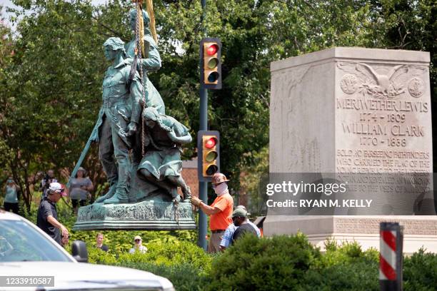 The statue of Meriwether Lewis, William Clark and Sacagawea is removed from Charlottesville, Virginia on July 10, 2021. The southern US city of...