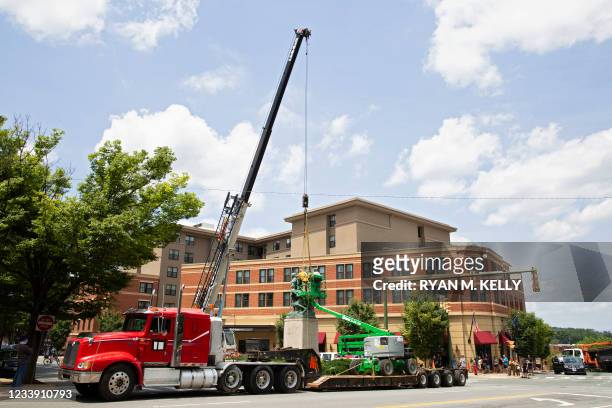 The statue of Meriwether Lewis, William Clark and Sacagawea is removed from Charlottesville, Virginia on July 10, 2021. The southern US city of...