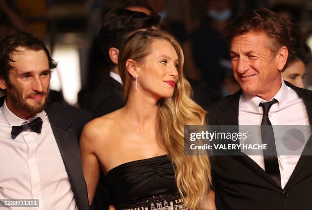 Actor and director Sean Penn arrives with his son US actor Hopper Jack Penn and daughter US actress Dylan Penn for the screening of the film "Flag...
