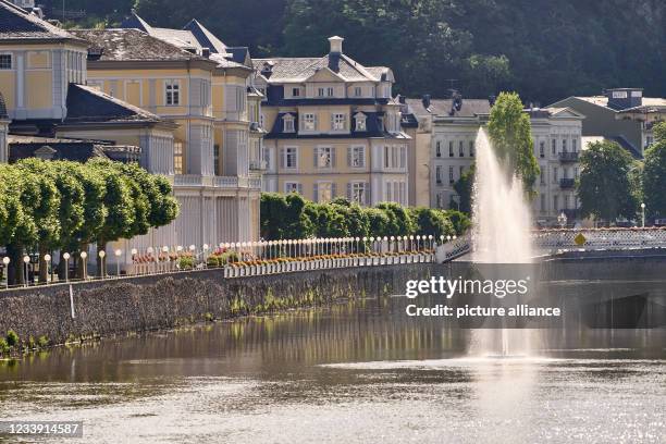 July 2021, Rhineland-Palatinate, Bad Ems: A fountain rises from the Lahn in front of the Bad Ems Kurhaus. The spa town on the Lahn hopes for the...