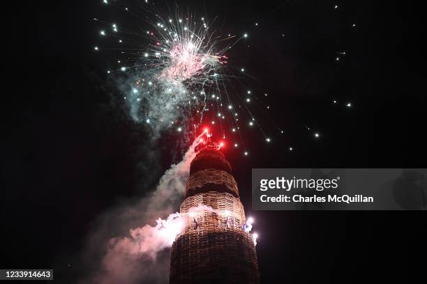 The 11th night bonfire which marks the beginning of the annual protestant 12th of July celebrations is lit on July 11, 2021 in Portadown, Northern...
