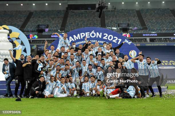 Argentina's players celebrate the title of champion during an awards ceremony after their victory against Brazil in a match at the Maracana stadium...