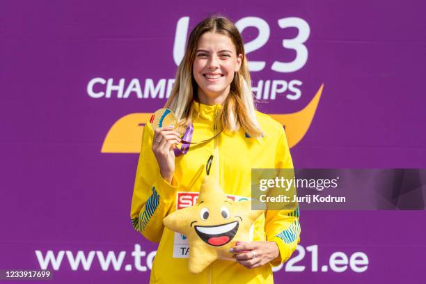 Yaroslava Mahuchikh of Ukraine poses with her medal after the women's high jump final on day four of the 2021 European Athletics U23 Championships at...