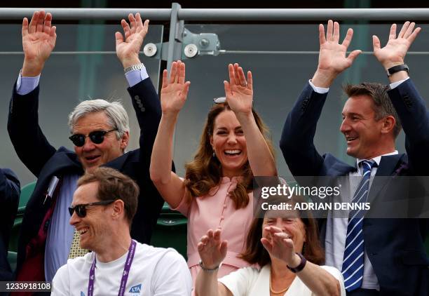 Britain's Catherine, Duchess of Cambridge , her father Michael Middleton and Scott Lloyd , CEO of the Lawn Tennis Association take part in a 'mexican...