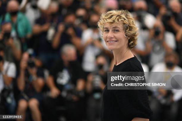 Belgian actress Cecile De France poses during a photocall for the film "De Son Vivant" at the 74th edition of the Cannes Film Festival in Cannes,...