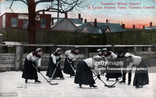 Ladies hockey team is practicing in this colored photographic postcard issued mid 1900s in Toronto, Ontario, Canada.