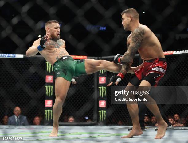 Nevada , United States - 10 July 2021; Conor McGregor, left, and Dustin Poirier in their lightweight fight during the UFC 264 event at T-Mobile Arena...