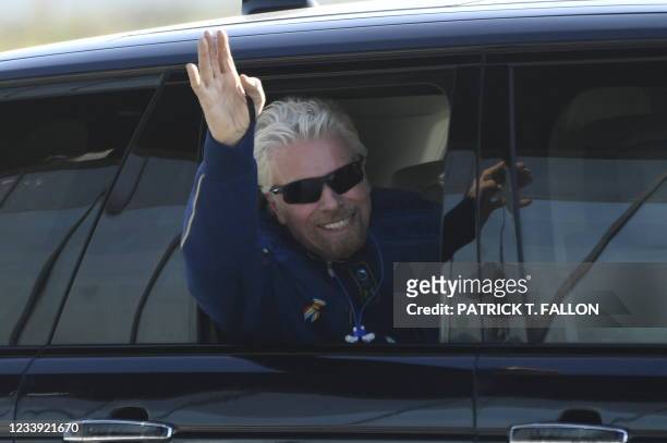 British billionaire Richard Branson is welcomed as he arrives at Spaceport America near Truth or Consequences, New Mexico, July 11, 2021 hours before...