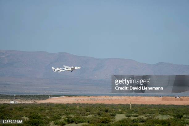 Virgin Galactic's VMS Eve carries the VSS Unity on takeoff from Spaceport America, July 11, 2021 in Truth Or Consequences, New Mexico. Aboard VSS...