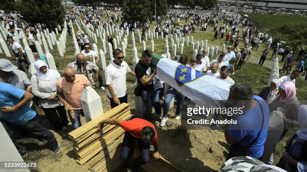 Victims of the Srebrenica Genocide, whose identities have been detected, are being buried at Potocari cemetery in Srebrenica, Bosnia and Herzegovina...