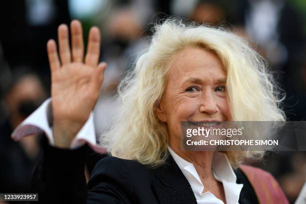 French actress Brigitte Fossey waves as she arrives for the screening of the film "Tre Piani" at the 74th edition of the Cannes Film Festival in...