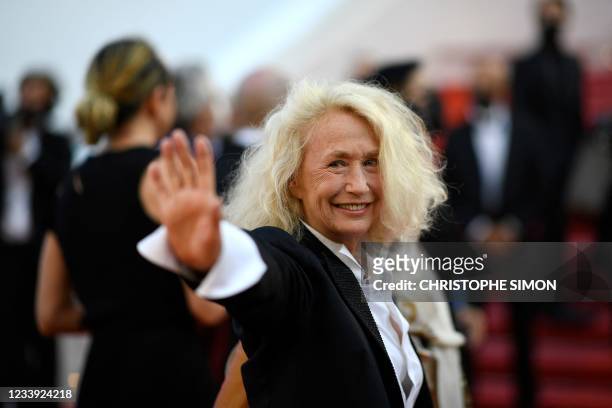 French actress Brigitte Fossey waves as she arrives for the screening of the film "Tre Piani" at the 74th edition of the Cannes Film Festival in...