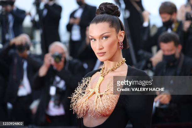 Model Bella Hadid poses as she arrives for the screening of the film "Tre Piani" at the 74th edition of the Cannes Film Festival in Cannes, southern...