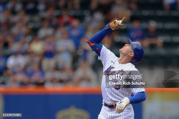 Brandon Nimmo of the New York Mets gestures after he hit a double against the Pittsburgh Pirates during the first inning of a game at Citi Field on...