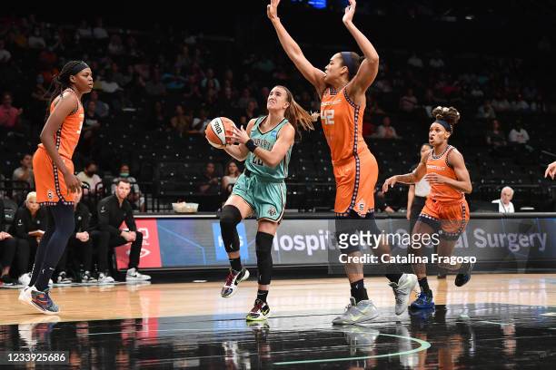 Sabrina Ionescu of the New York Liberty drives to the basket against the Connecticut Sun on July 11, 2021 at the Barclays Center in Brooklyn, New...