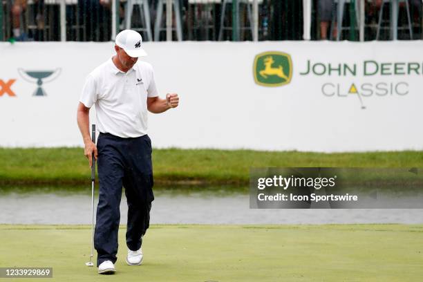 Golfer Lucas Glover reacts to making the winning par putt on the 18th hole during the final round of the John Deere Classic on July 11, 2021 at TPC...