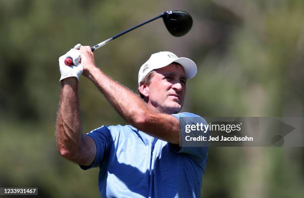 Former NBA player Vinny Del Negro tees off on the 18th hole during the final round of the American Century Championship at Edgewood Tahoe South golf...