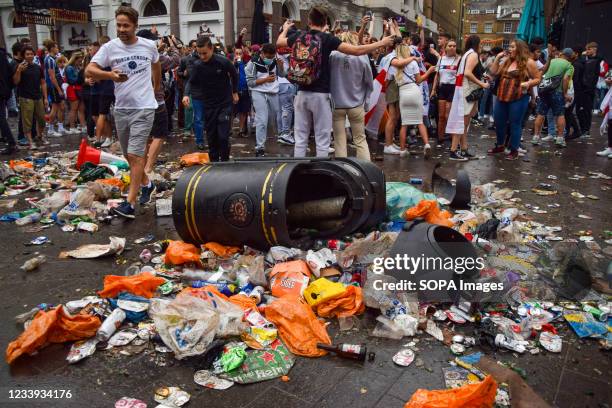 England supporters destroy garbage bins and leave huge amounts of trash in Leicester Square ahead of the England vs Italy Euro 2020 football final...