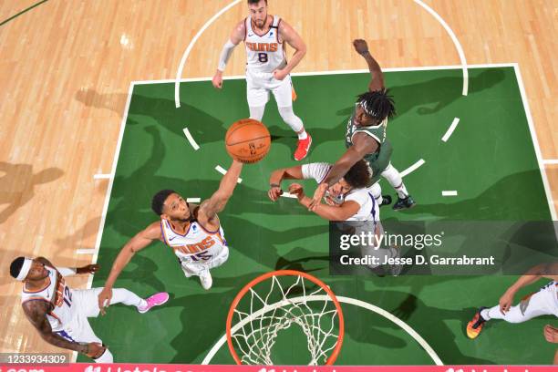 Cameron Payne of the Phoenix Suns grabs the rebound against the Milwaukee Bucks during Game Three of the 2021 NBA Finals on July 11, 2021 at Fiserv...