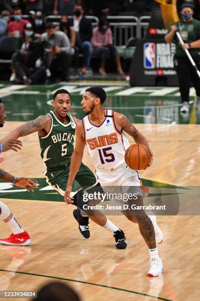 Cameron Payne of the Phoenix Suns handles the ball against the Milwaukee Bucks during Game Three of the 2021 NBA Finals on July 11, 2021 at Fiserv...