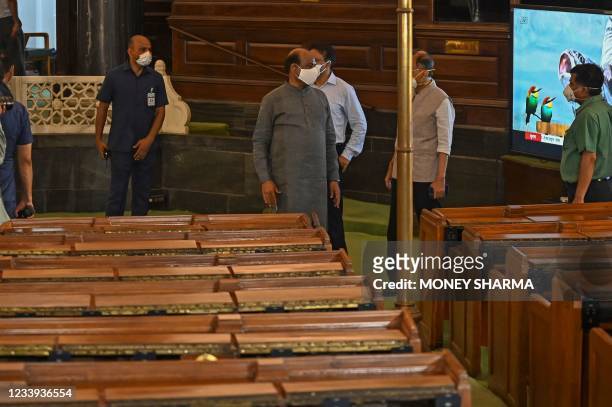 Speaker of the Lok Sabha Om Birla , looks on as he inspects the Indian Parliament house before the beginning of the monsoon session in New Delhi on...