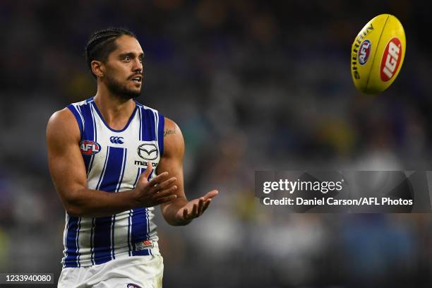 Aaron Hall of the Kangaroos marks the ball during the 2021 AFL Round 17 match between the West Coast Eagles and the North Melbourne Kangaroos at...