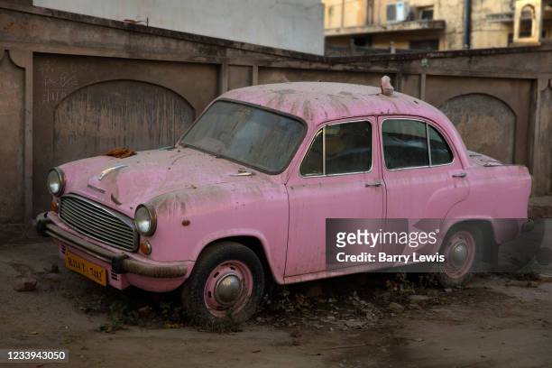 Classic pink Hindustan Ambassador car on 4th February 2018 in Jaipur, Rajasthan, India. Despite its British origins, the Ambassador produced from...