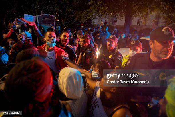 Demonstrators hold a protest in response to the police killing of George Floyd near the U.S. Capitol on May 29, 2020 in Washington, DC. Across...