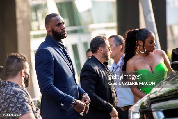 Basketball player/actor LeBron James and wife Savannah Brinson arrive at the Warner Bros Pictures world premiere of "Space Jam: A New Legacy" at the...