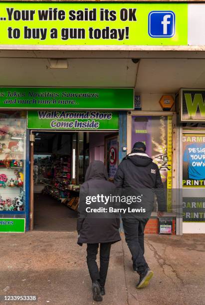 'Your wife said it's OK to buy a gun today' Novelty shop on the Blackpool sea front, with pellet guns, air rifles and replica guns for sale at the...