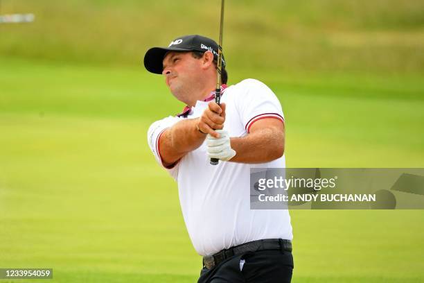 Golfer Patrick Reed plays from green-side bunker during a practice round for The 149th British Open Golf Championship at Royal St George's, Sandwich...