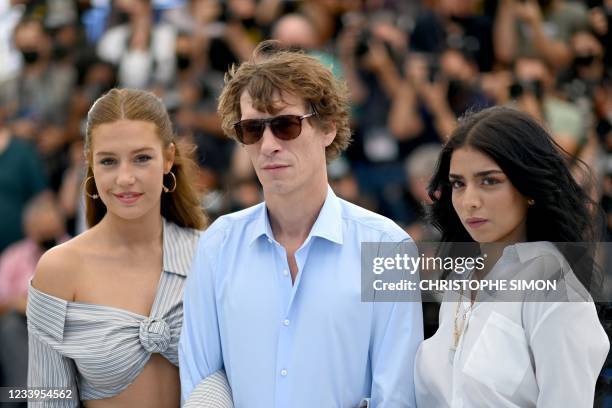 French actress Adele Exarchopoulos, French director Cedric Jimenez and French actress Kenza Fortas pose during a photocall for the film "Bac Nord" at...