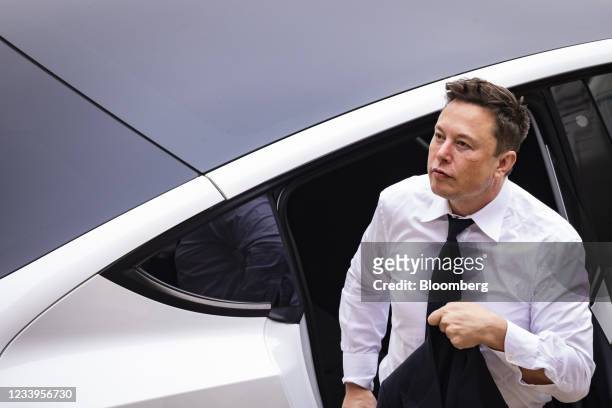Elon Musk, chief executive officer of Tesla Inc., arrives at court during the SolarCity trial in Wilmington, Delaware, U.S., on Tuesday, July 13,...