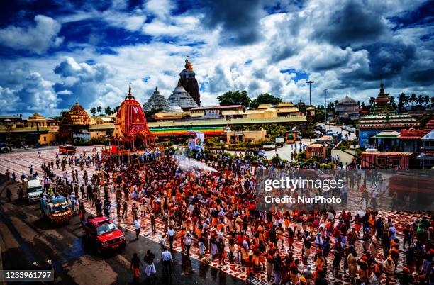 Shree Jagannath temple ditties wooden chariots seen in front of the temple and it is being pull by only the traditional temple servitors on the...