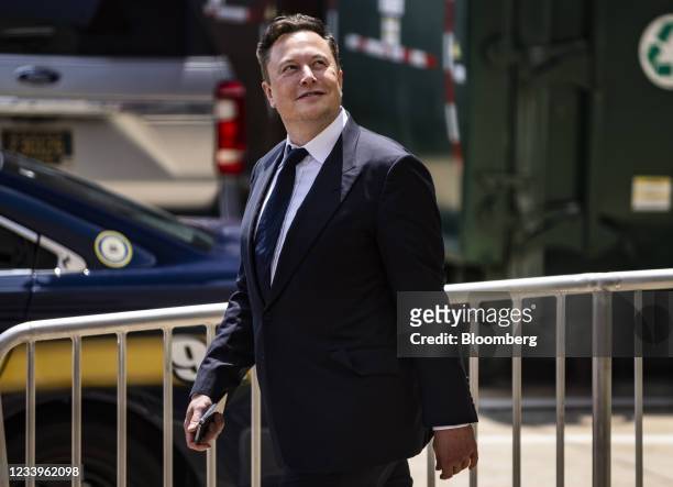 Elon Musk, chief executive officer of Tesla Inc., departs court during the SolarCity trial in Wilmington, Delaware, U.S., on Tuesday, July 13, 2021....