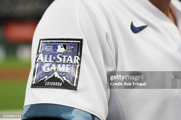 An All-Star Game logo rests on the sleeve of an American League team jersey during the 91st MLB All-Star Game presented by Mastercard at Coors Field...