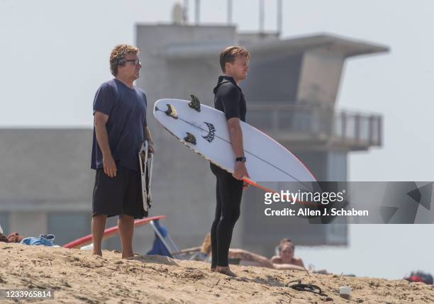 Huntington Beach, CA Dino Andino, left, former pro surfer and Kolohes father, and Brett Simpson, not pictured, of Huntington Beach, a two-time U.S....