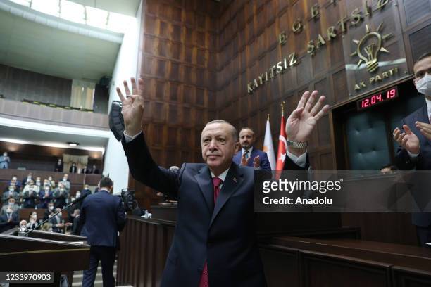 Turkish President and leader of the Justice and Development Party , Recep Tayyip Erdogan greets members during the parliamentary group meeting of AK...