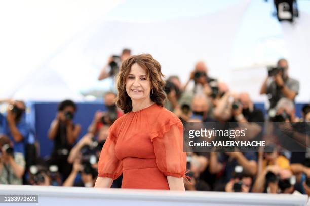 French actress and director Valerie Lemercier poses during a photocall for the film "Aline, The Voice OF Love" at the 74th edition of the Cannes Film...
