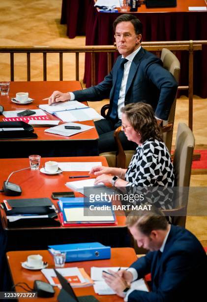 Outgoing Prime Minister Mark Rutte, outgoing Minister Tamara van Ark for Medical Care and outgoing Minister Hugo de Jonge of Health, Welfare and...