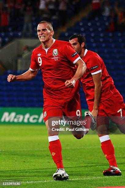 Steve Morison of Wales celebrates scoring during the UEFA EURO 2012 group G qualifying match between Wales and Montenegro at the Cardiff City Stadium...