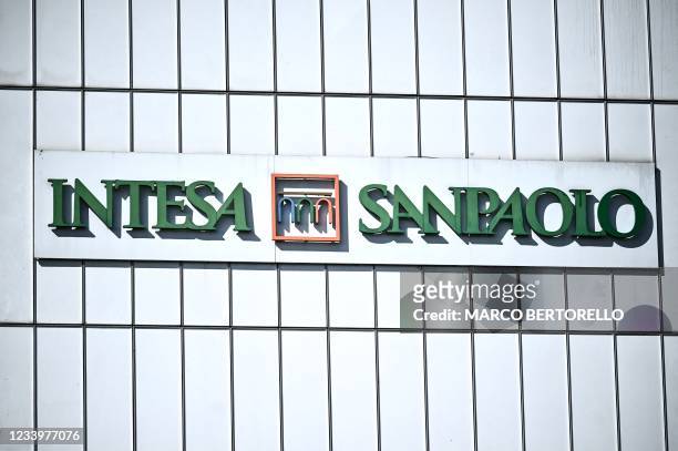 The brand of Italian bank Intesa Sanpaolo is pictured on the Intesa Sanpaolo Building, designed by Italian architect Renzo Piano, on July 14, 2021 in...
