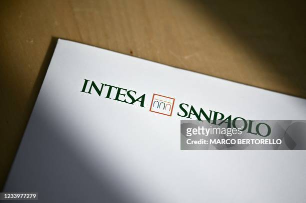 The brand of Italian bank Intesa Sanpaolo is pictured on July 14, 2021 in Turin, northwestern Italy.