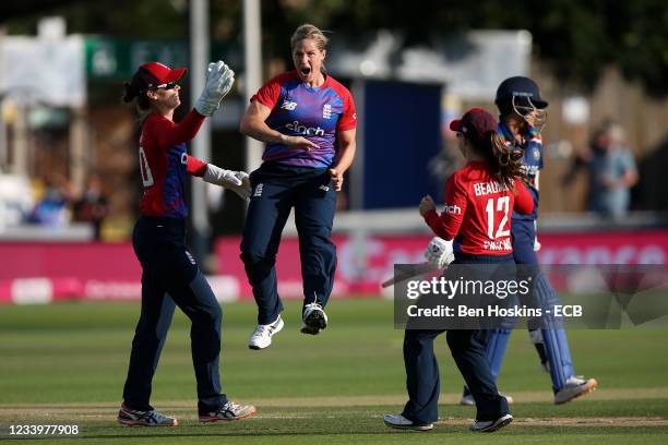 Katherine Brunt of England celebrates dismissing Shafali Verma of India during the Women's Third T20 International between England and India at...