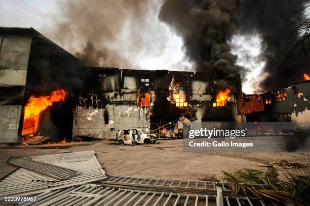 Burning factory in Sea Cow Lake area on July 12, 2021 in Durban, South Africa. It is reported that a considerable number of shops and businesses were...