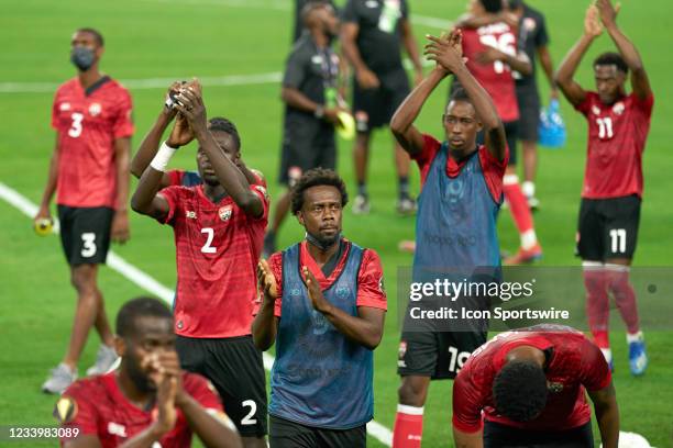 Trinidad and Tobago players celebrate after game action during a CONCACAF Gold Cup group stage match between Mexico and Trinidad & Tobago on July 10,...