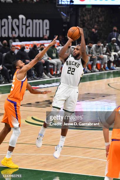 Khris Middleton of the Milwaukee Bucks shoots the ball against the Phoenix Suns during Game Four of the 2021 NBA Finals on July 14, 2021 at Fiserv...