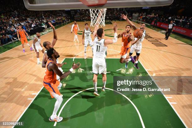 Cameron Payne of the Phoenix Suns shoots the ball against the Milwaukee Bucks during Game Four of the 2021 NBA Finals on July 14, 2021 at Fiserv...